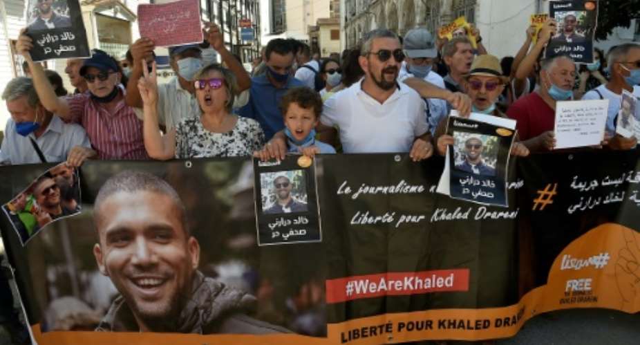 Supporters of Algerian journalist Khaled Drareni, who was sentenced to two years in prison, had been hoping for a lenient judgement, if not acquittal.  By RYAD KRAMDI AFP