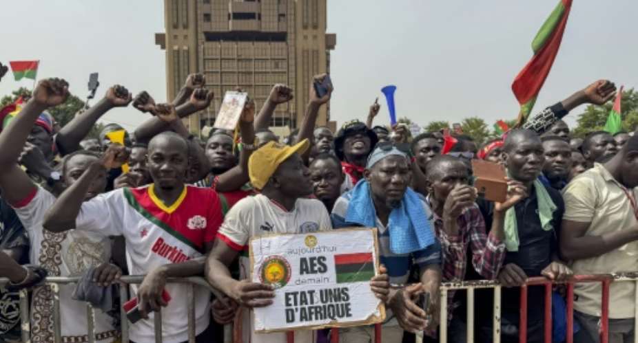 Supporters of Burkina Fasos junta rallied in the capital, days after the government said it had uncovered a plot to overthrow the military authorities.  By - (AFP)