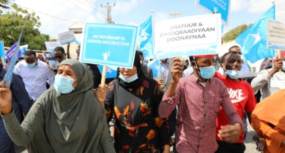 Supporters of different opposition presidential candidates demonstrate in Mogadishu on February 19, 2021.  By - AFPFile
