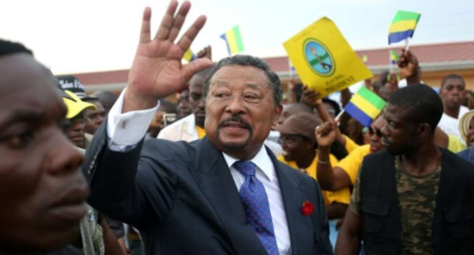 Supporters of Gabon opposition leader Jean Ping, pictured in April 2017, made threats against the current president of Gabon and urged Gabonese citizens to revolt; Ping accused his opponent of voter fraud, sparking a wave of violence.  By STEVE JORDAN AFPFile