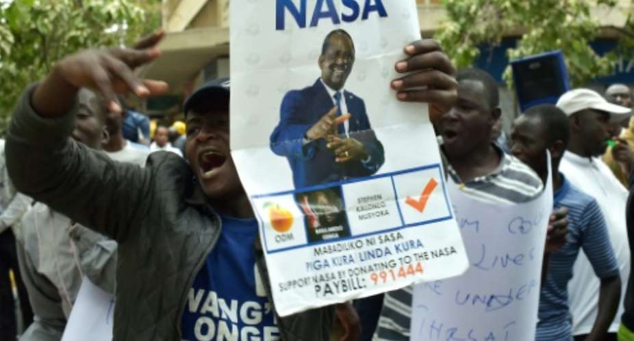 Supporters of opposition leader Raila Odinga were jubilant when Kenya's Supreme Court threw out last month's election result.  By SIMON MAINA AFP