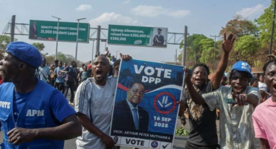 Supporters of Peter Mutharika, 85, and his Democratic Progressive Party (DPP) took to the streets in celebration.  By Amos GUMULIRA (AFP)