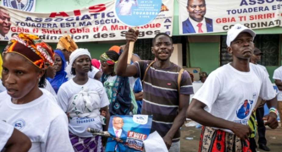 Supporters of President Faustin-Archange Touadera packed a stadium as campaigning opened in the CAR.  By Annela NIAMOLO (AFP)