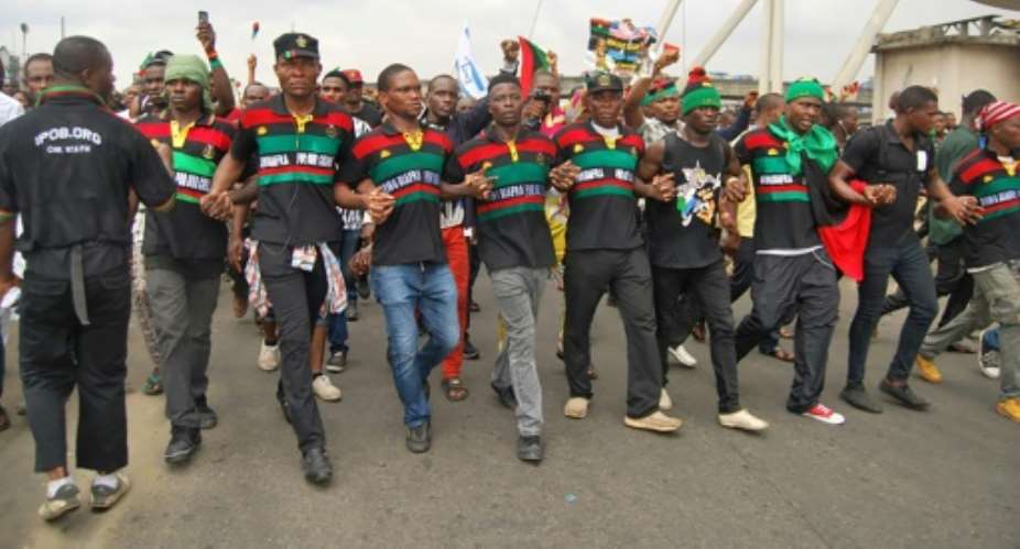 Supporters of the Indigenous People of Biafra IPOB march in Port Harcourt on January 20, 2017 in support of the US president-elect.  By STRINGER AFPFile
