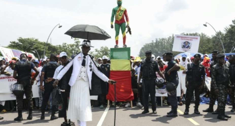 Supporters of the president thronged the capital for a rally before Sundays election.  By Daniel BELOUMOU OLOMO (AFP)
