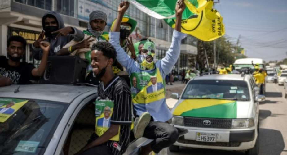Supporters of the ruling Kulmiye party take to the streets ahead of Wednesdays vote.  By LUIS TATO (AFP)