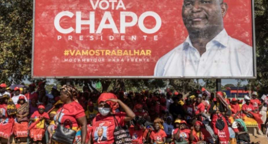 Supporters showed their support for Daniel Chapo, presidential candidate for the ruling Mozambique Liberation Front (FRELIMO).  By MARCO LONGARI (AFP)