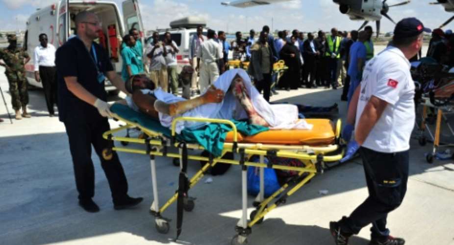 Survivors of Somalia's worst-ever bombing were taken to Turkey for treatment.  By MOHAMED ABDIWAHAB AFP