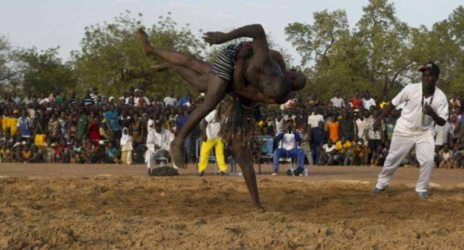 Wrestlers compete in the National Wrestling championship in Tougan, an annual national championship in the northwestern town of Tougan, Burkina Faso.  By Nabila Hadad (AFP)