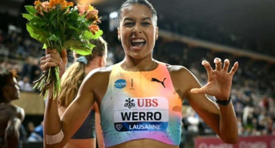 Switzerlands Audrey Werro celebrates after winning the womens 800m at the Lausanne Diamond League.  By Fabrice COFFRINI (AFP)