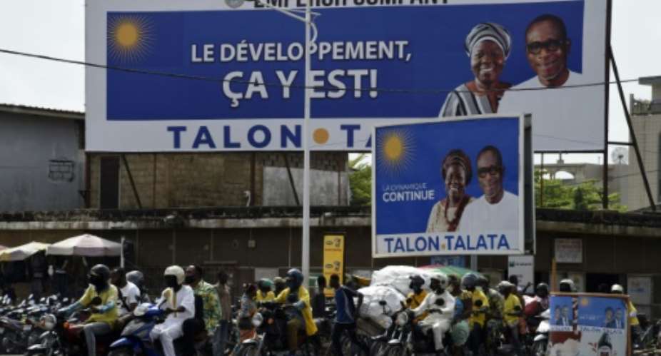 Talon seen here in a campaign billboard is running against two little known rivals.  By PIUS UTOMI EKPEI AFP