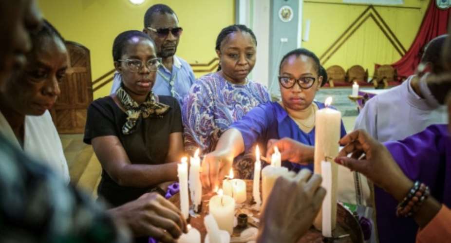 Tanzanians held church services to mark a year since the election killings.  By - (AFP)