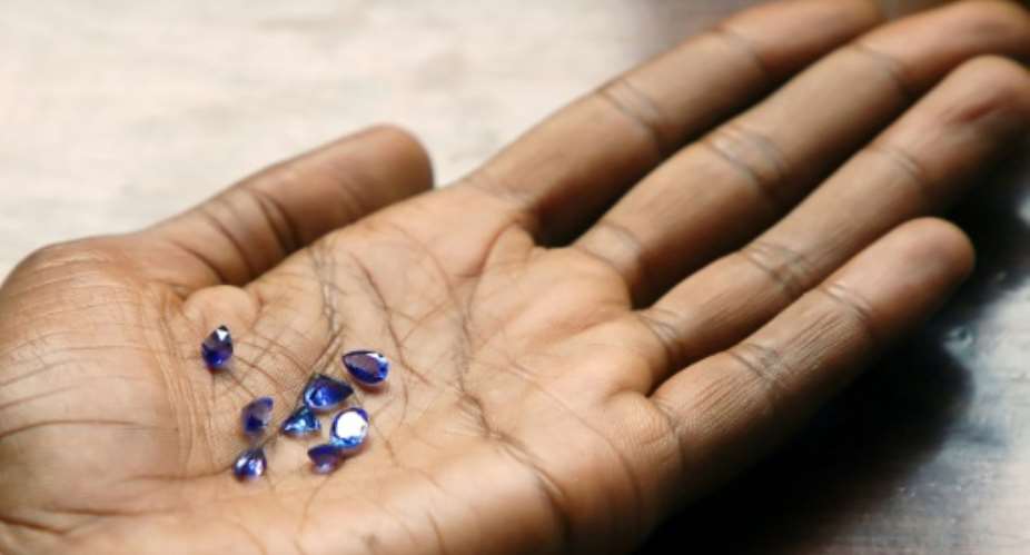 Tanzanite is prized by gem-makers for its extraordinary violet-blue hue. The gems seen here were mined in 2006, when they were valued at around 1,500.  By MATT BROWN AFP