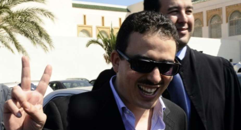 Taoufiq Bouachrine, director of Morroccan daily Akhbar al-Youm, during a court appearance in 2009 -- one of several run-ins with Moroccan authorities that culminated in a 12-year prison sentence last year.  By STR AFPFile