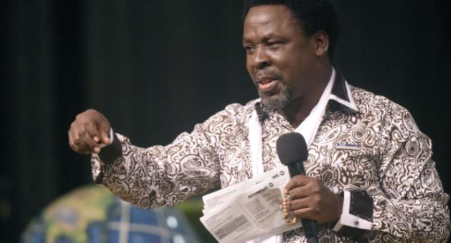 TB Joshua is one of several so-called faith healers in Nigeria claiming an ability to cure people of AIDS.  By PIUS UTOMI EKPEI AFPFile