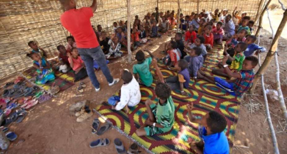 Teachers among the tens of thousands of Ethiopians who have streamed into neighbouring Sudan in recent weeks have set up schools for refugee children with help from the Norwegian Refugee Council.  By ASHRAF SHAZLY AFP