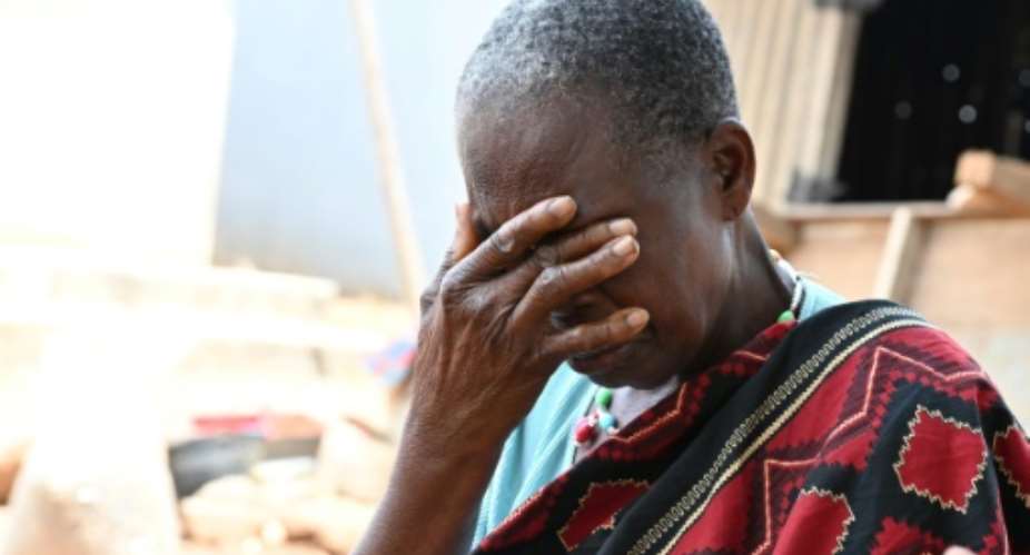 Tears of a grandmother: Amena Djaha.  By Issouf SANOGO AFPFile