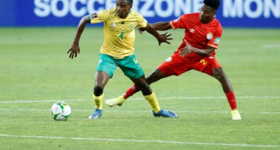 Teboho Mokoena L of South Africa and Suteman Hamid R of Ethiopia contest possession during a World Cup qualifier in Johannesburg on Tuesday..  By Phill Magakoe AFP