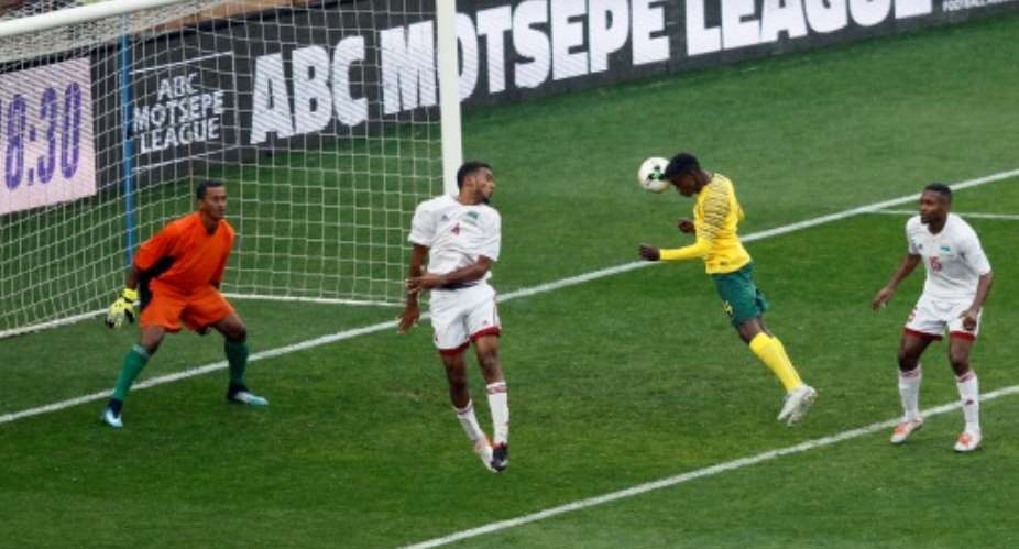 Teboho Mokoena scored with a header as South Africa thrashed Seychelles.  By PHILL MAGAKOE AFP