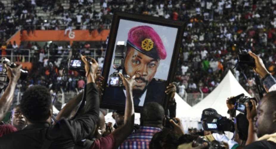 Tens of thousands attended a funeral concert at Abijan's main stadium for Ivorian music star DJ Arafat who died in a motorbike crash last month.  By ISSOUF SANOGO AFP