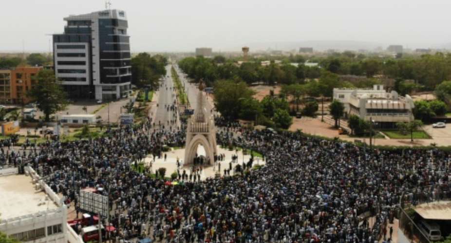 Tens of thousands of people marched in Mali's capital Bamako in April to condemn the government for failing to stop killings and to object to France's military presence.  By MICHELE CATTANI AFPFile