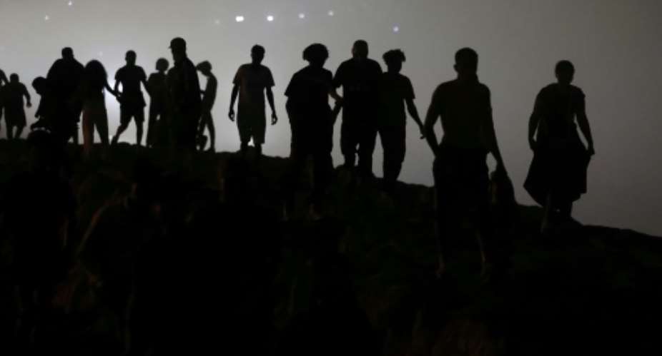 Tens of thousands of people swam to the Spanish enclave from neighbouring Morocco.  By Abdel Majid BZIOUAT (AFP)