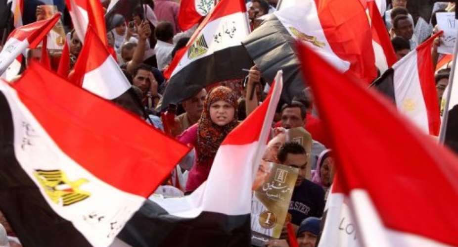 Thousands of Brotherhood supporters had packed Cairos iconic Tahrir Square in anticipation of a victory.  By Marwan Naamani (AFP/File)