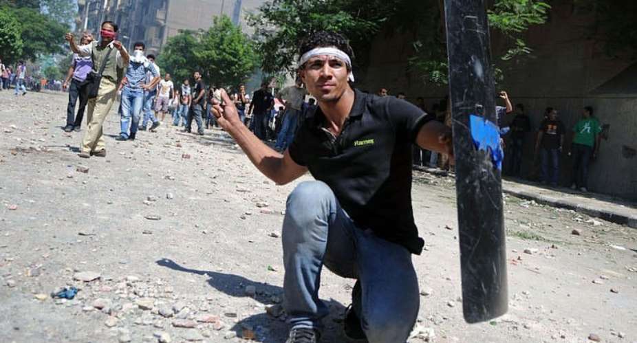 The trial comes against a backdrop of two days of bloody clashes in Cairo between police and protesters.  By Mohamed Hossam (AFP)