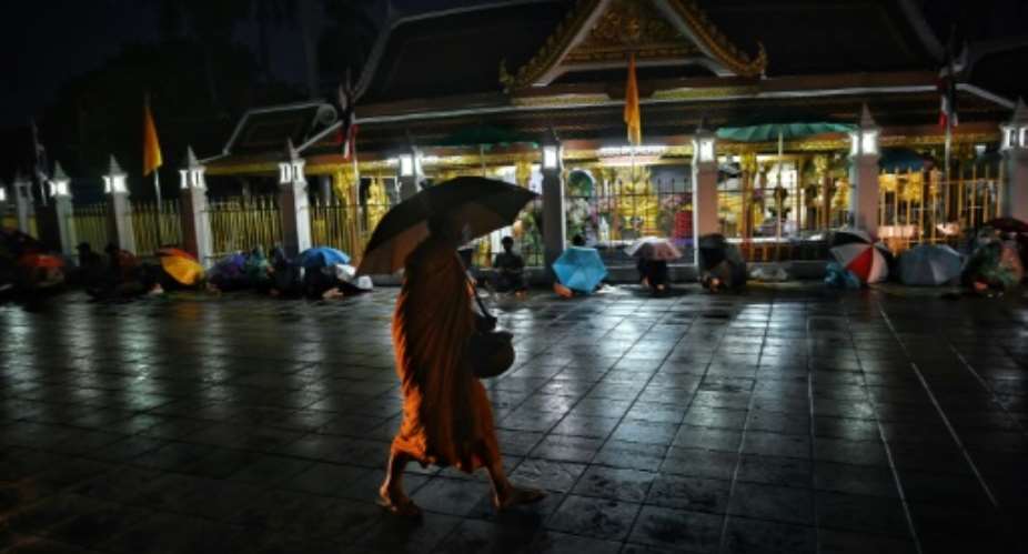 Thailand announced fresh curbs, including a night-time curfew in Bangkok.  By Lillian SUWANRUMPHA AFP