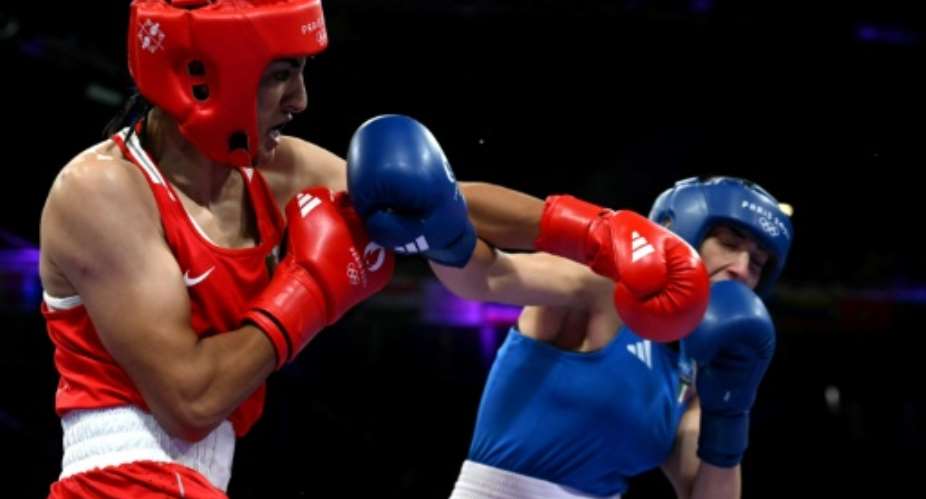The 25-year-old caused her Italian rival Angela Carini to retire hurt during a fight at the Olympics after just 46 seconds.  By MOHD RASFAN (AFP)