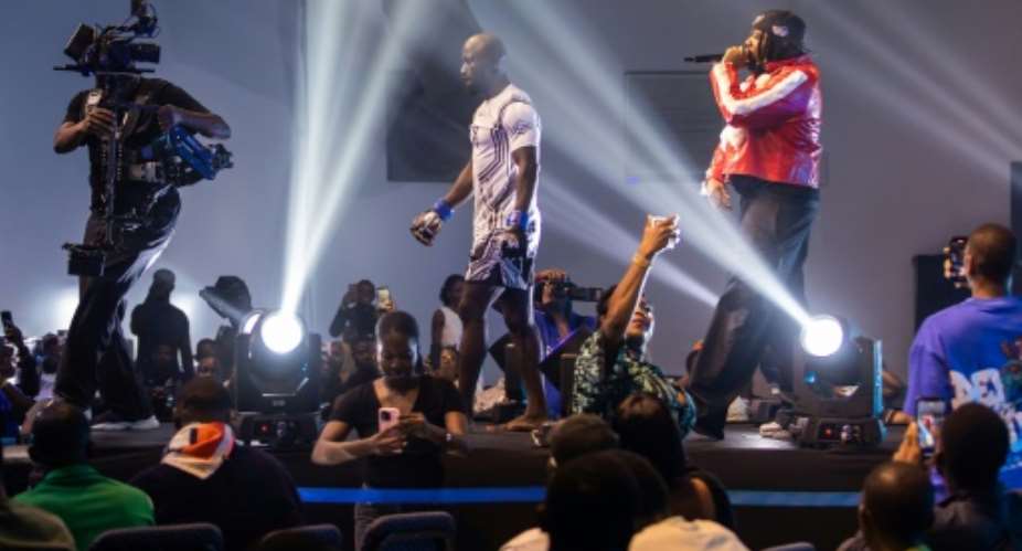 The African Knockout Championship MMA tournament in Nigeria was packed to the rafters with devotees of the sport.  By TOYIN ADEDOKUN (AFP)