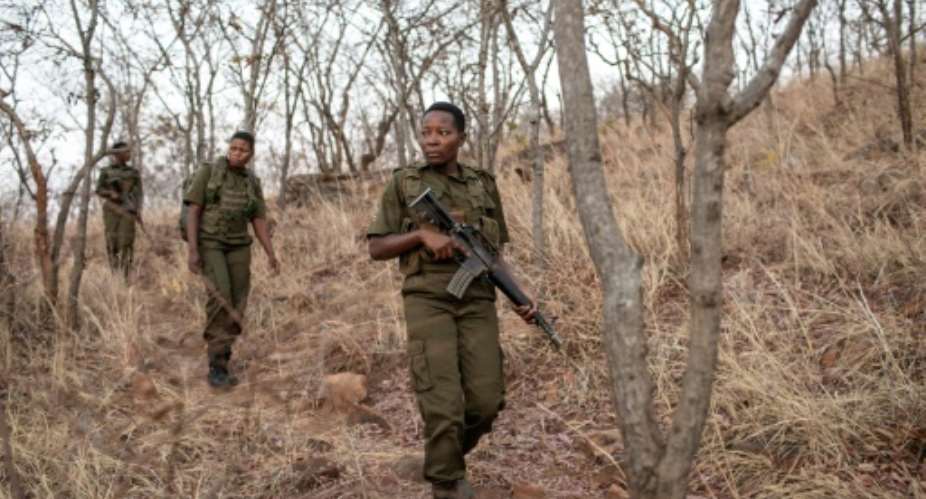 The Akashinga are all-female anti-poaching rangers in northern Zimbabwe.  By GIANLUIGI GUERCIA AFP