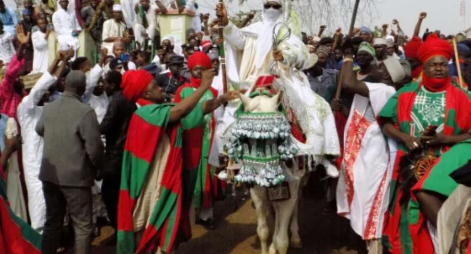 The annual procession sees the traditional mayor of Kano, Muhammadu Sanusi, go through the town on horseback and pay tribute to the governor.  By AMINU ABUBAKAR AFPFile
