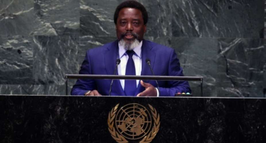 The attack on the ruling coalition spokesman's house came just months before elections to replace President Joseph Kabila.  By Bryan R. Smith AFPFile