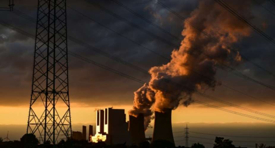The average annual emissions for the 2013-2022 period was 53 gigatonnes of carbon dioxide -- primarily from the use of fossil fuels like oil and gas, the report said.  By INA FASSBENDER (AFP/File)