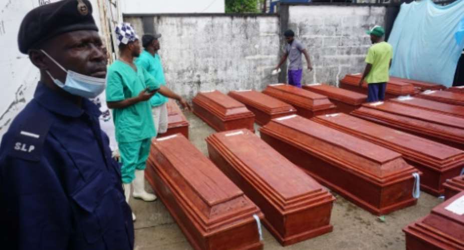 The bodies of all 27 civilians killed in riots and raids last August were kept at a morgue in the capital Freetown for two months.  By Saidu BAH AFP