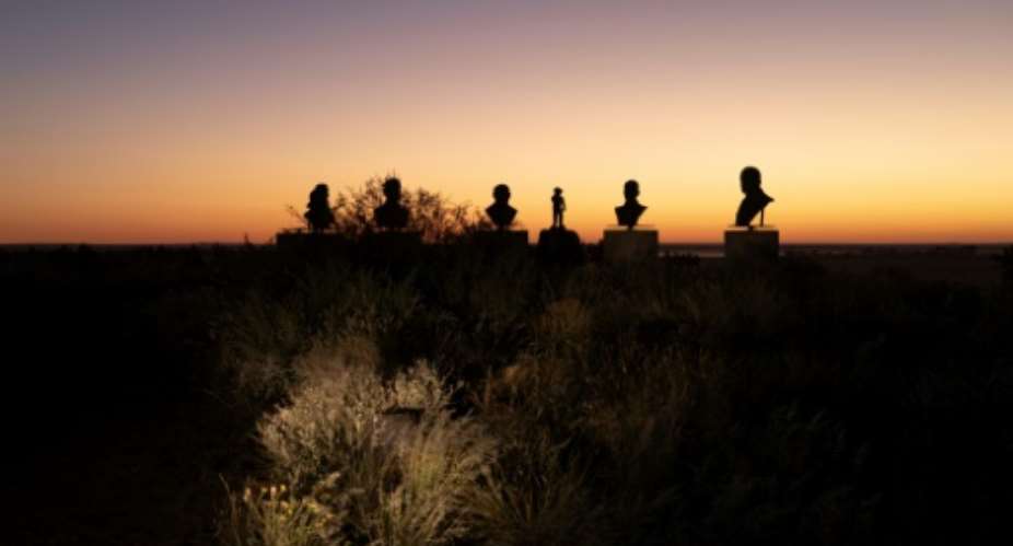 The bronze busts of several past Afrikaner leaders including apartheid-era leaders, look over Orania, the last all Afrikaner town in South Africa.  By MARCO LONGARI (AFP)