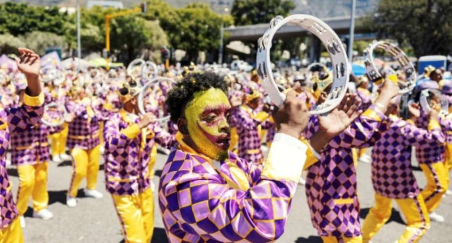 The Cape Town minstrel parade is said to be the biggest in Africa.  By GIANLUIGI GUERCIA (AFP)