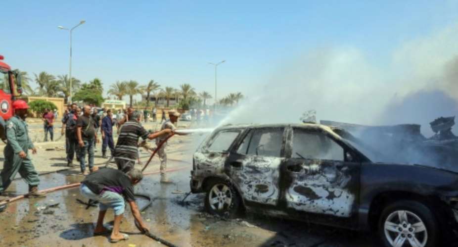 The car bomb in Benghazi went off as a UN convoy was passing through a commercial area, a security official said.  By - AFP