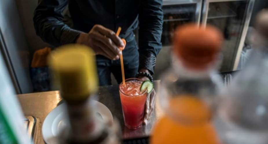 The Chapman is a non-alcoholic drink that is widely popular in Nigeria made from soft drinks and red in colour. It is drunk by young and old.  By STEFAN HEUNIS AFP