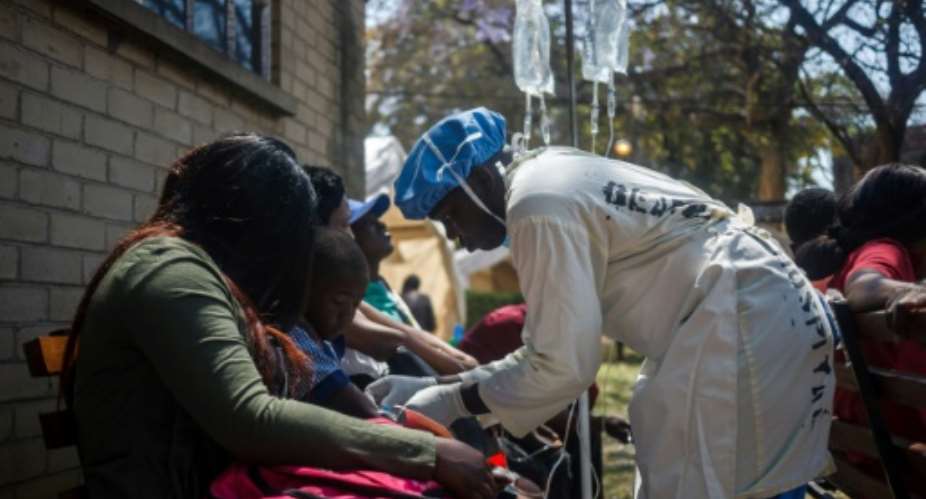 The cholera outbreak was detected in a Harare suburb earlier this month.  By Jekesai NJIKIZANA AFPFile