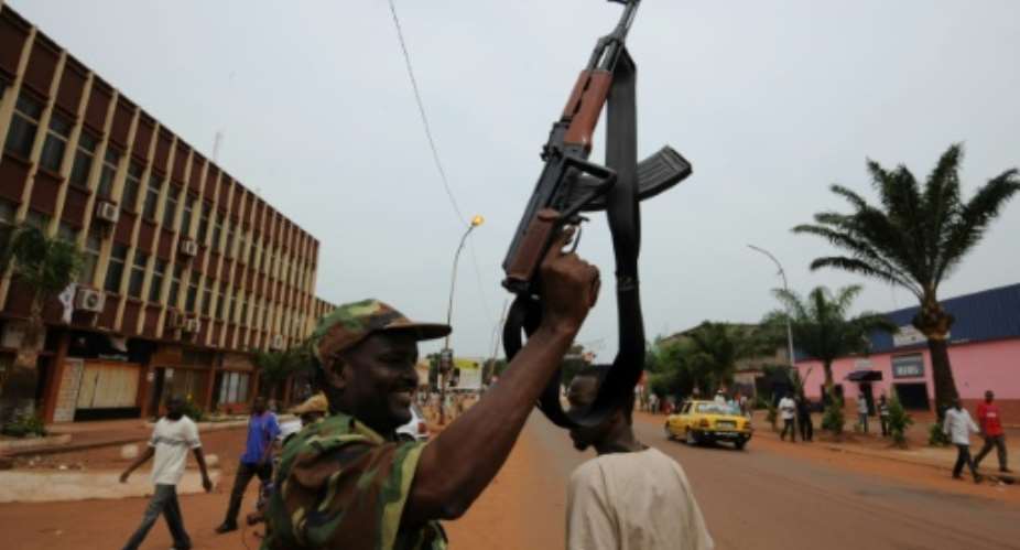 The conflict between the Muslim-majority Seleka movement pictured in 2013 and anti-Balaka Christian militias in Central Africa has killed thousands and caused massive population displacement.  By SIA KAMBOU AFP