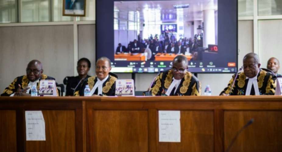 The Constitutional Court's decision was contained in a document of over 200 pages.  By Badru KATUMBA AFP