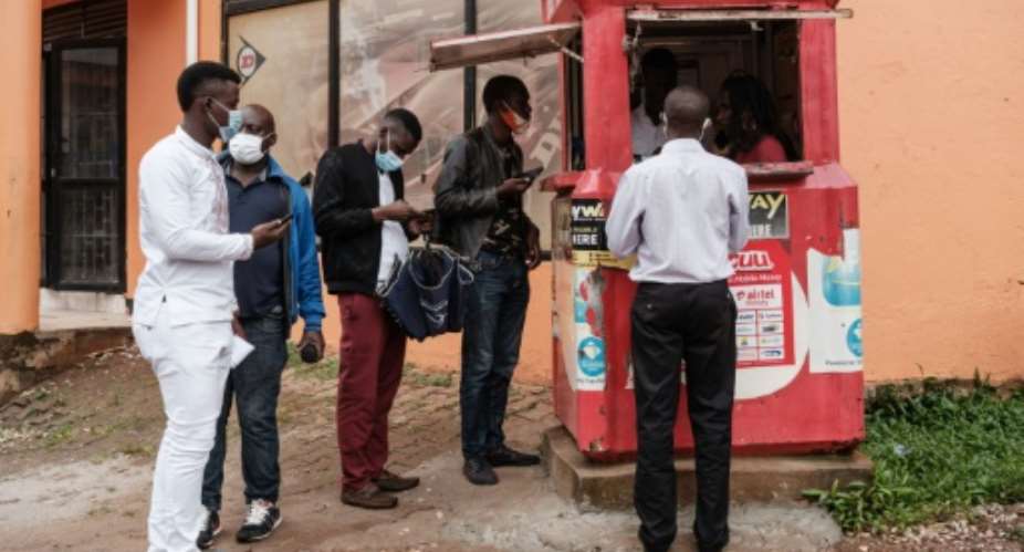 The cost of mobile data is a sensitive subject in Uganda as most people connect to the internet with their phones.  By YASUYOSHI CHIBA AFPFile
