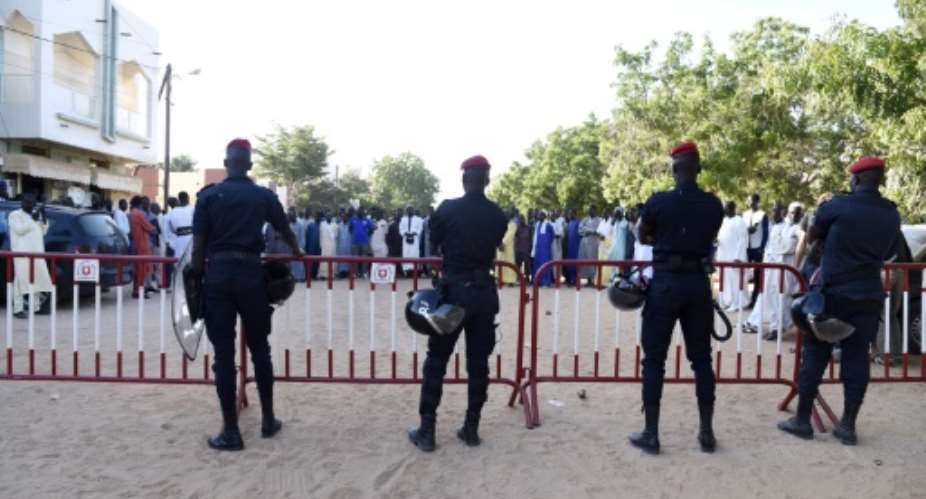 The court case in the northern Senegal was held amid tension as police blocked roads and supporters of the teacher, Cheikhouna Gueye, gathered behind barriers.  By SEYLLOU AFP