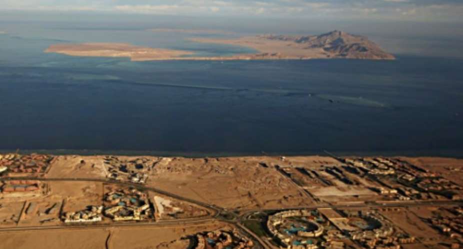 The deal to hand over the Red Sea islands of Tiran foreground and Sanafir background to Saudi Arabia provoked accusations that Cairo had sold the strategic islands.  By STRINGER AFPFile