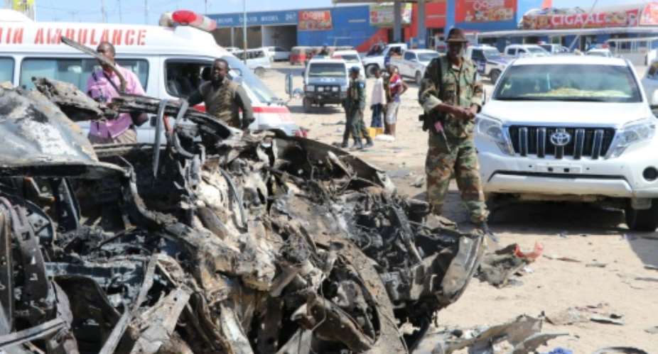 The devastating car bomb blast ripped through a busy area of the Somali capital.  By Abdirazak Hussein FARAH AFP