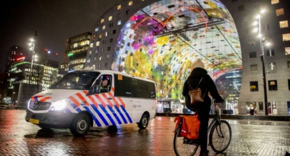 Dutch curfew upheld in court as South Africa donates jabs