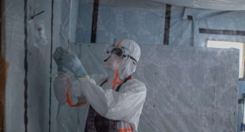 The Ebola outbreak has affected five provinces in DR Congo and crossed the border into Uganda, but so far spared Kinshasa.  By BENEDICTION MURHABAZI (AFP)