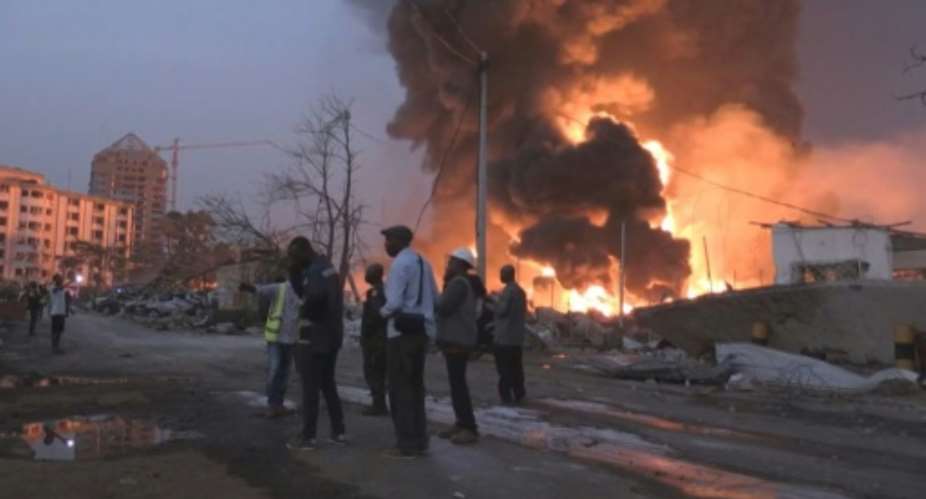 The explosion and fire at Guinea's main fuel depot caused 'extensive damage', officials said.  By STRINGER AFP
